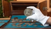 Library janitor discovers silver coin cache